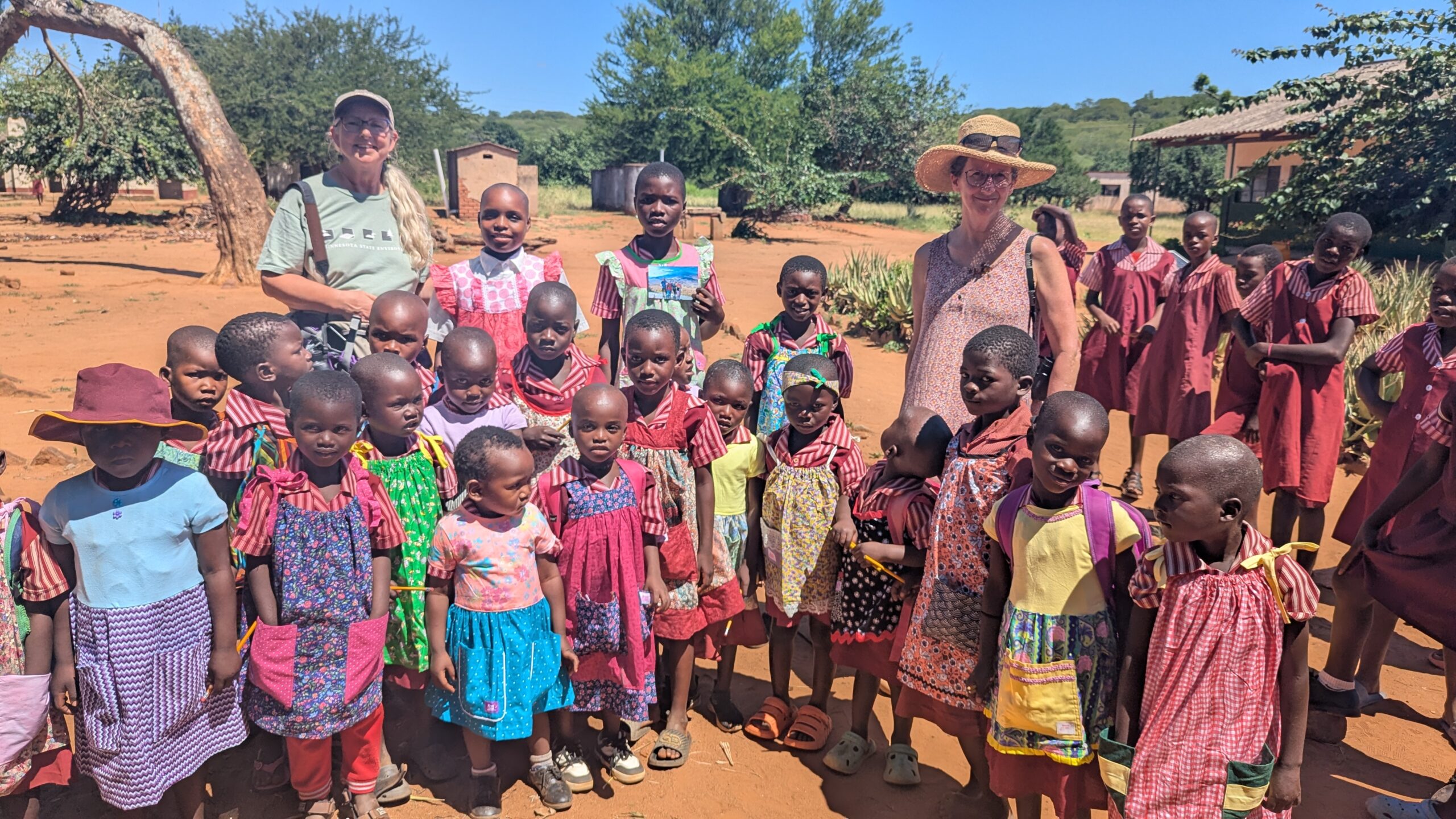 Distributing dresses at Humani Primary
